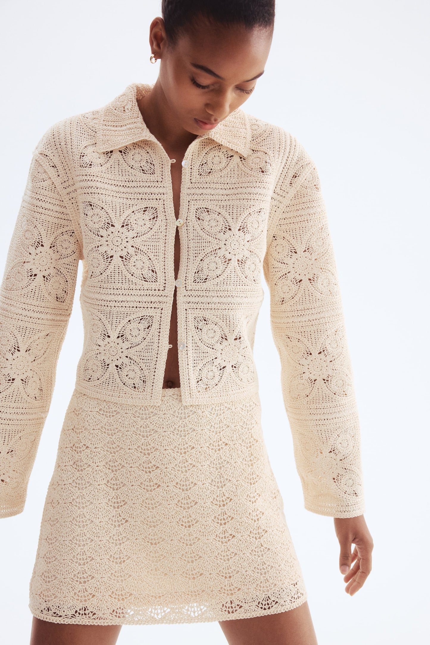 Crochet-look mini skirt