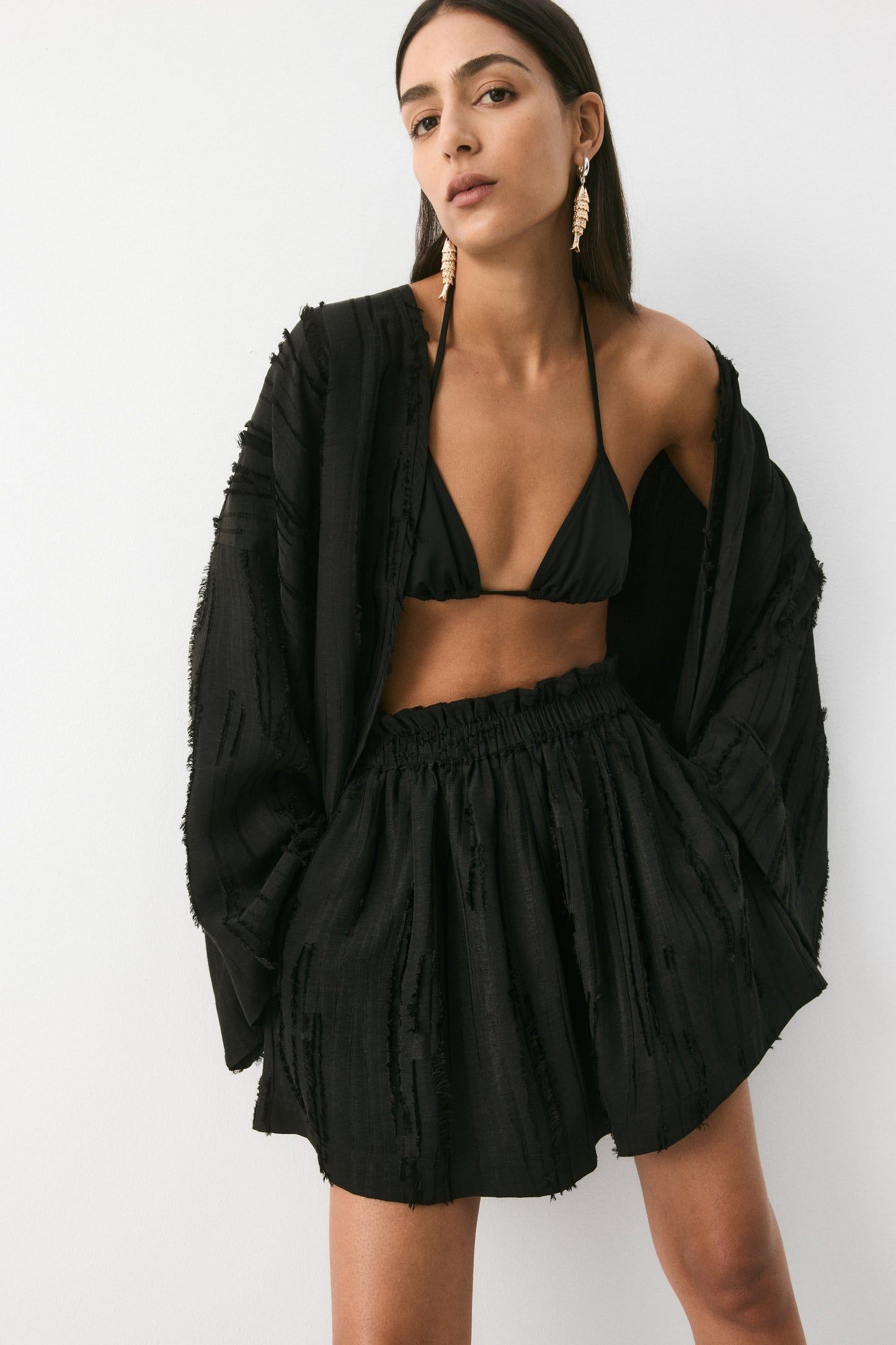 Frayed paper bag shorts
