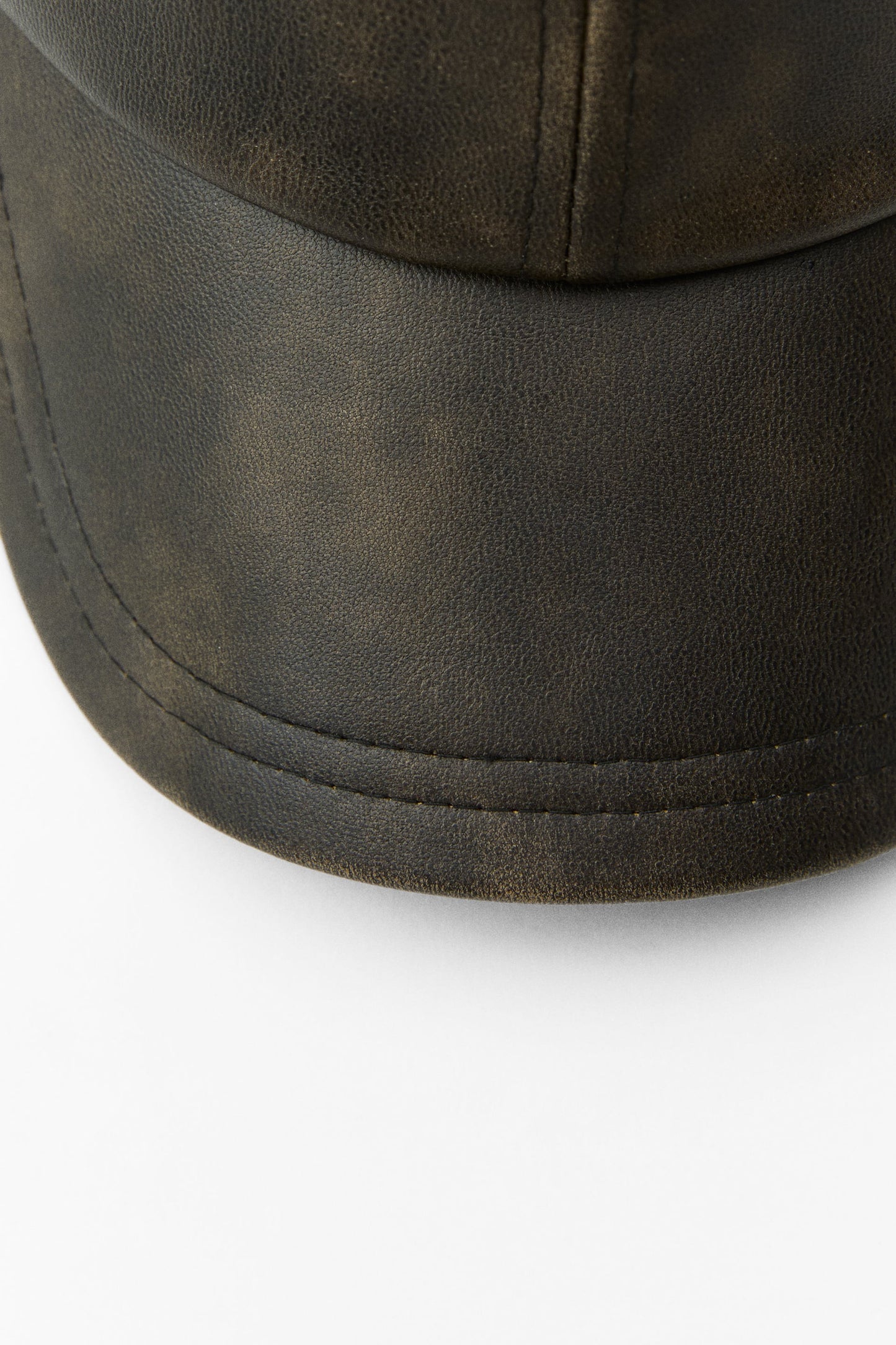 Faux leather cap