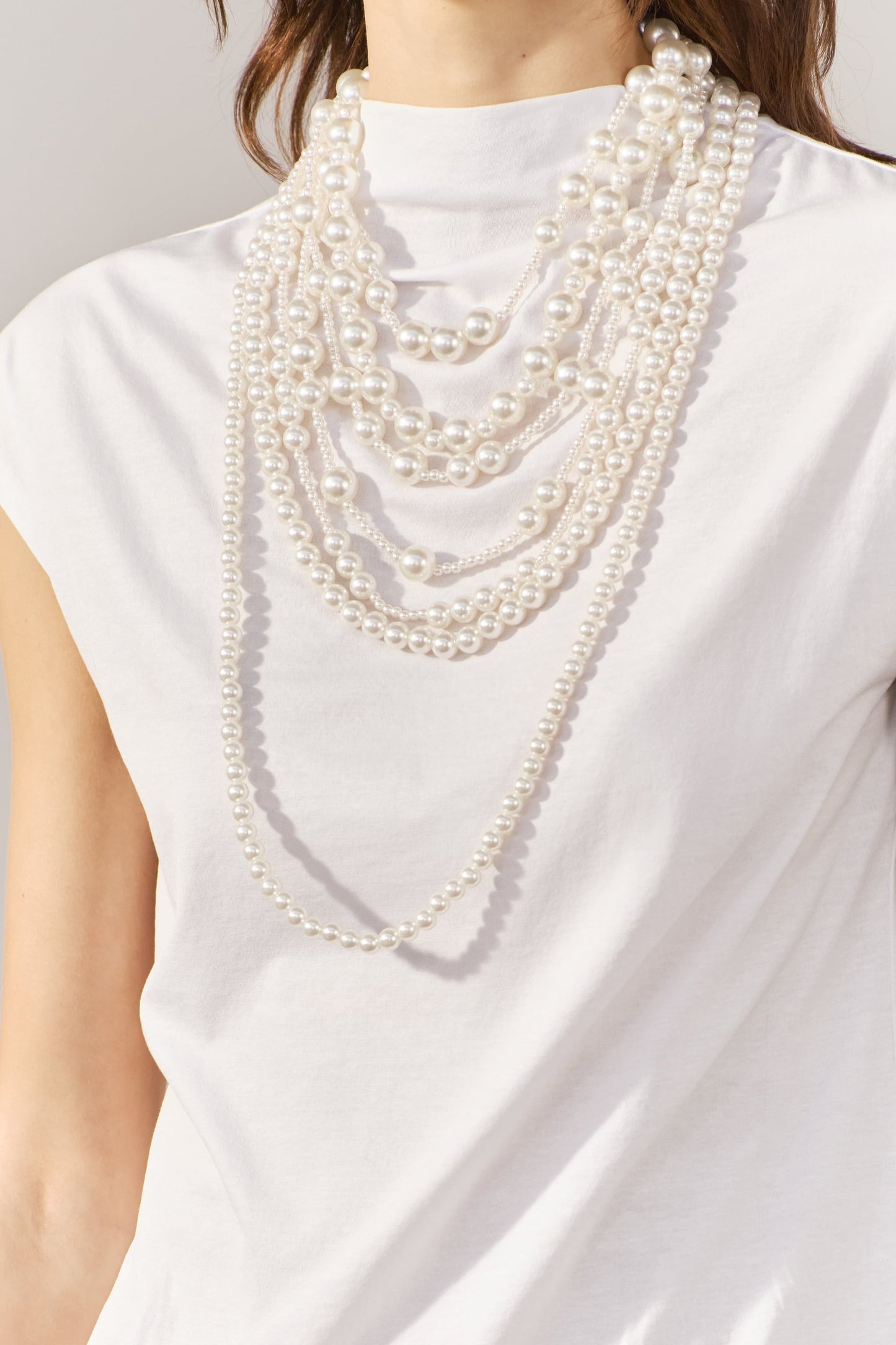 Long faux pearl necklace