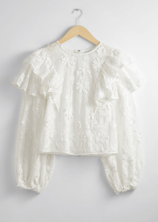 Embroidered ruffle blouse
