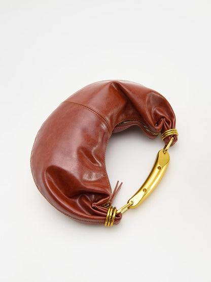 Handbag with metal handle