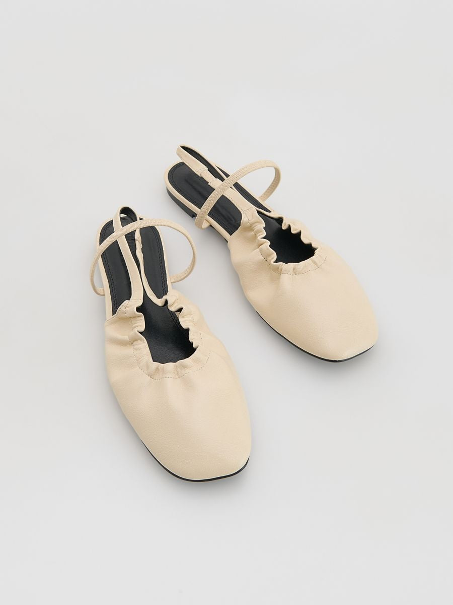 Open heel pumps