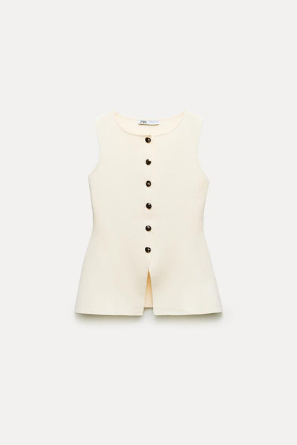 Knit waistcoat top with gold button