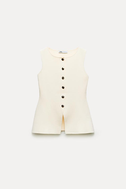 Knit waistcoat top with gold button