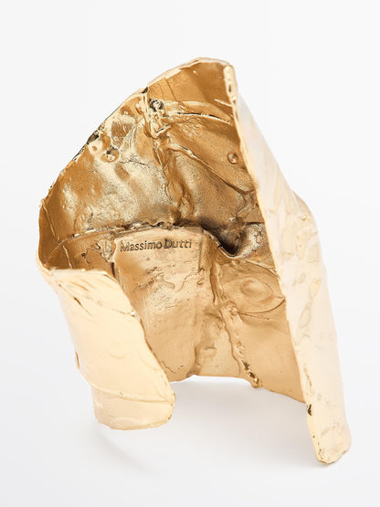 Irregular-shaped cuff