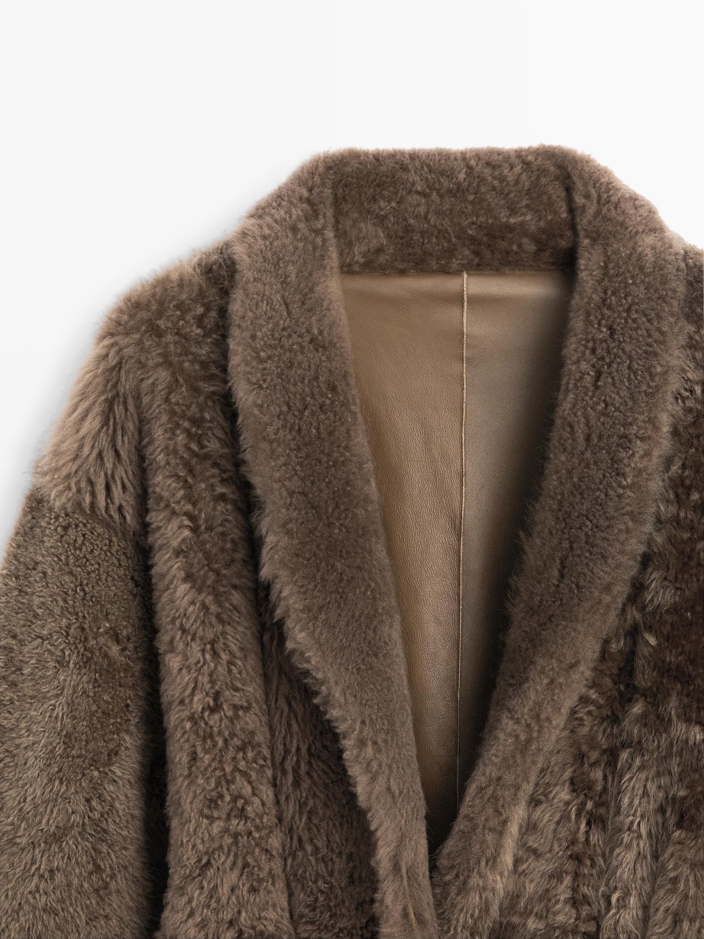 Long mouton coat with belt