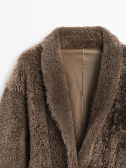 Long mouton coat with belt