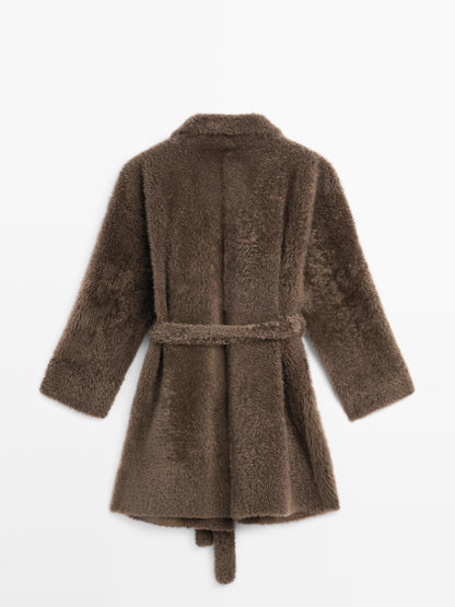 Long mouton coat with belt