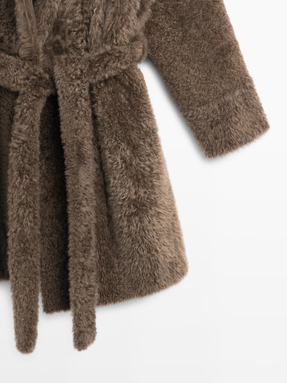Long mouton coat with belt
