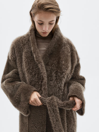 Long mouton coat with belt