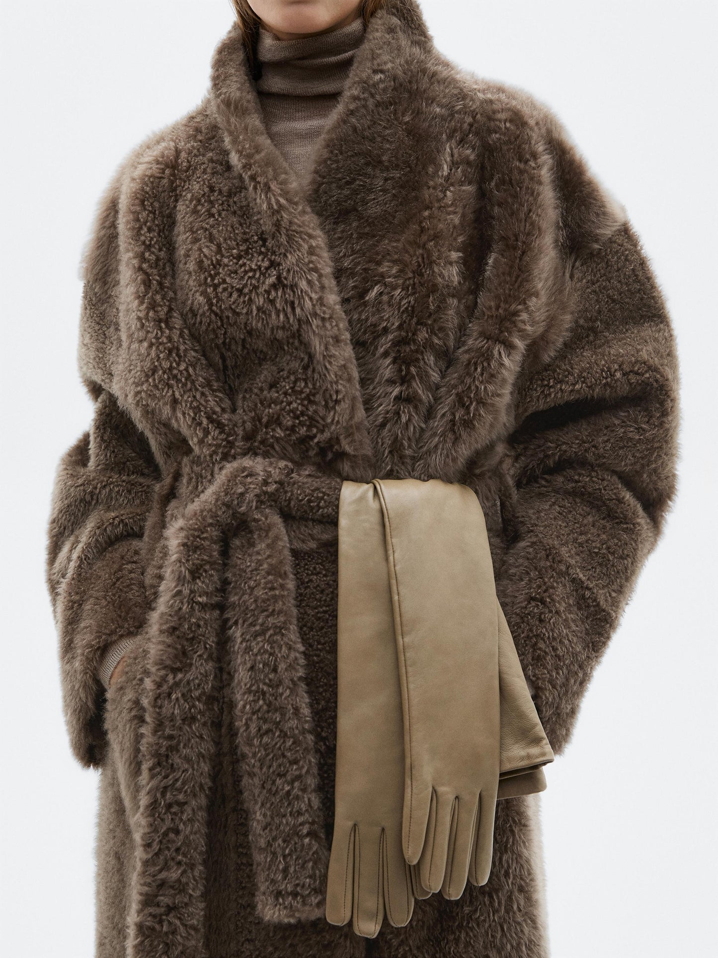 Long mouton coat with belt