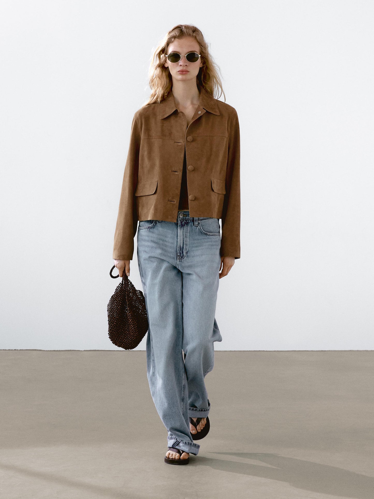 Suede leather jacket with lined buttons