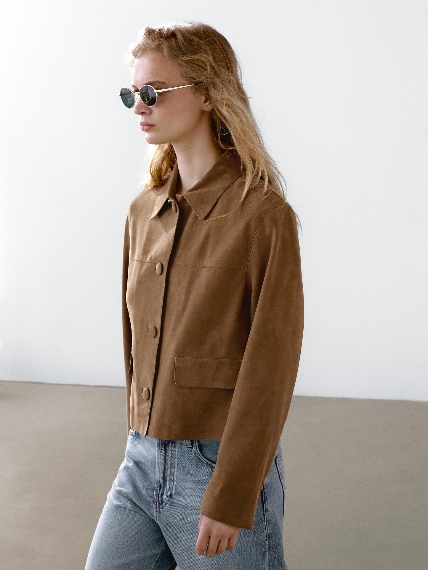 Suede leather jacket with lined buttons