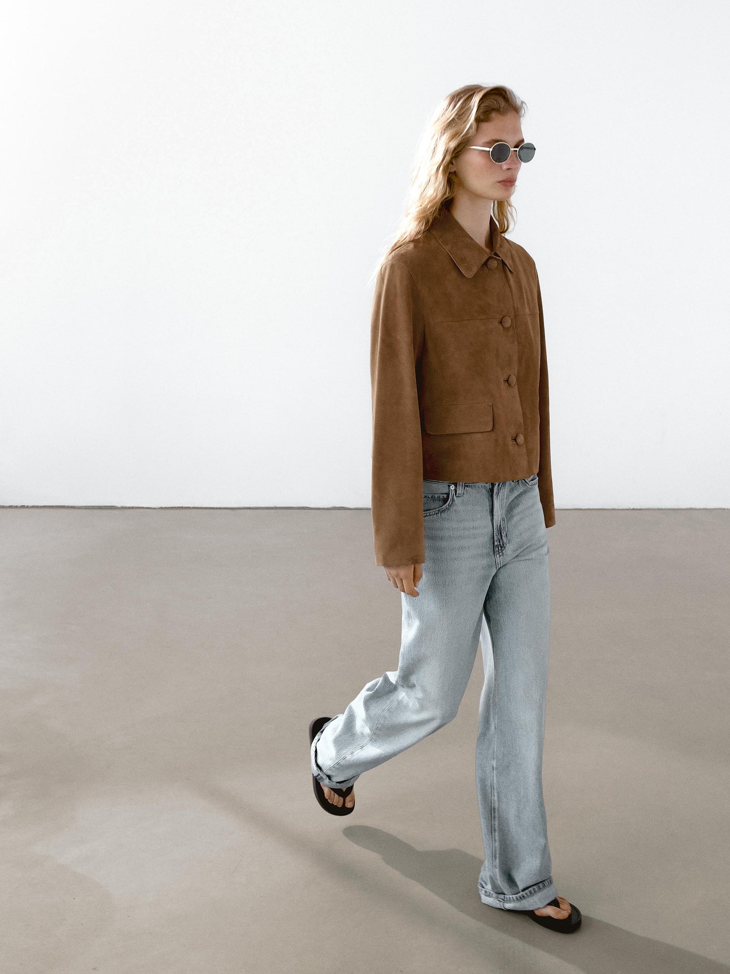 Suede leather jacket with lined buttons