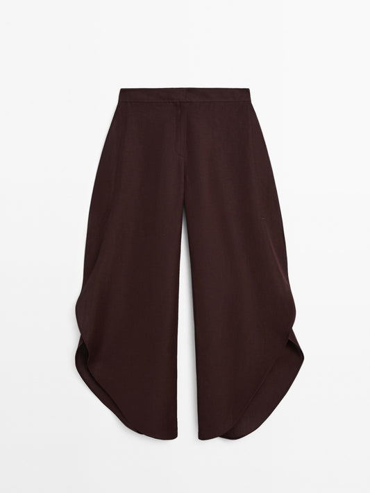 Flowing trousers with side vents