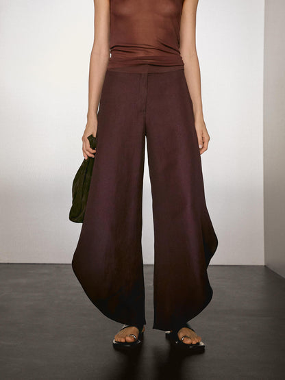 Flowing trousers with side vents