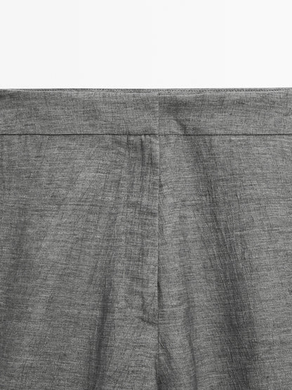Balloon fit trousers with button details