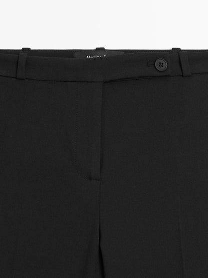 Darted trousers with elasticated hems