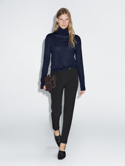 Darted trousers with elasticated hems