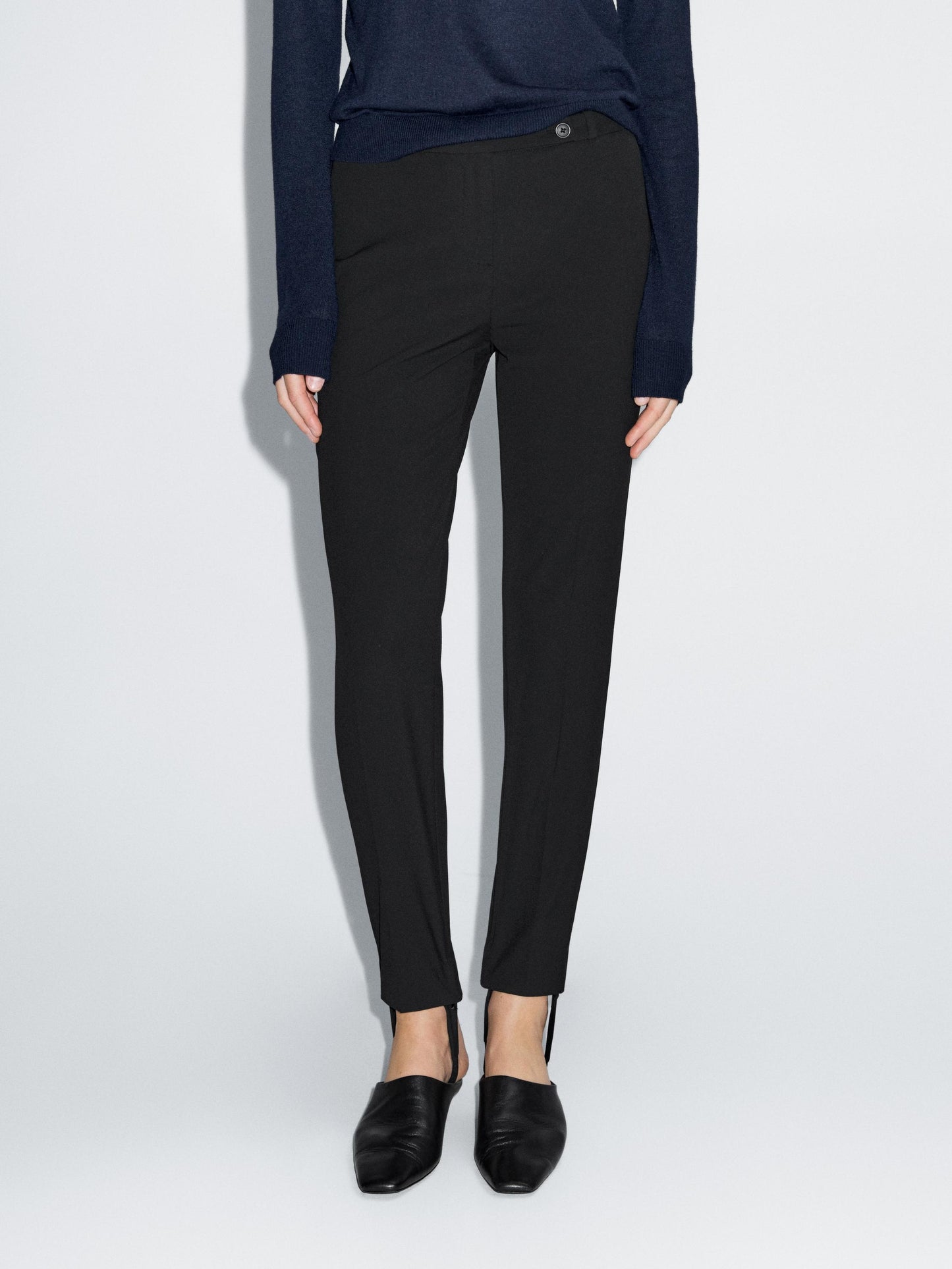 Darted trousers with elasticated hems