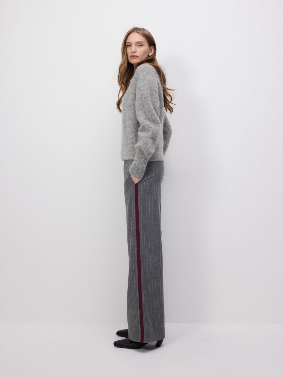 Wide leg trousers with side straps