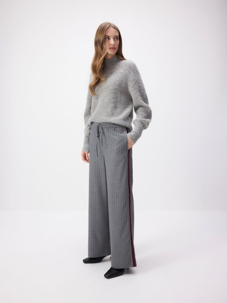 Wide leg trousers with side straps