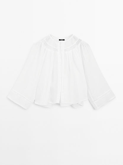 Flowing blouse with lace detail