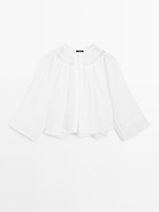 Flowing blouse with lace detail