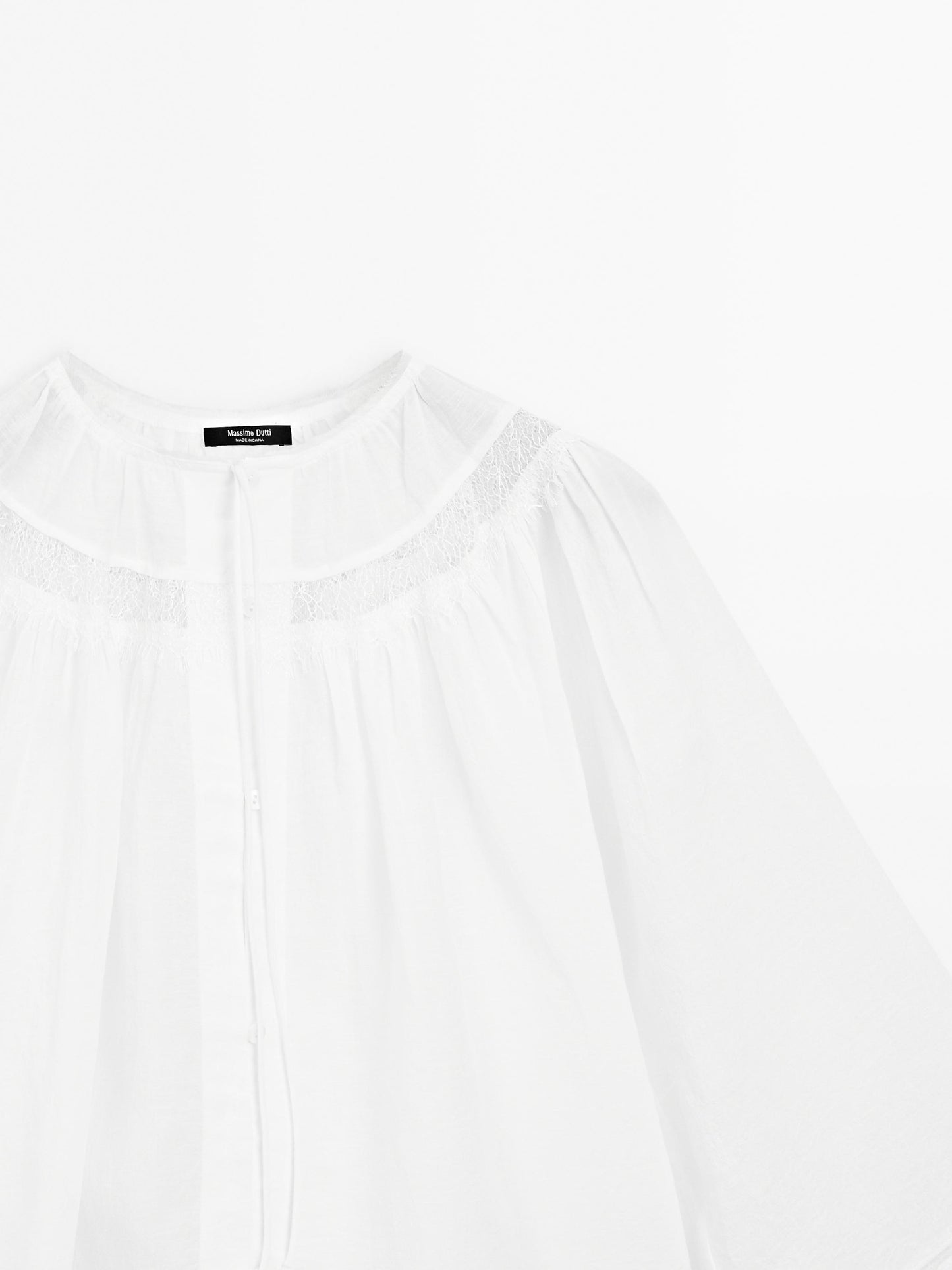 Flowing blouse with lace detail
