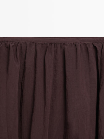 Pleated balloon midi skirt