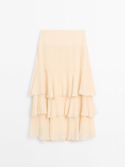 Long ruffled skirt with sash