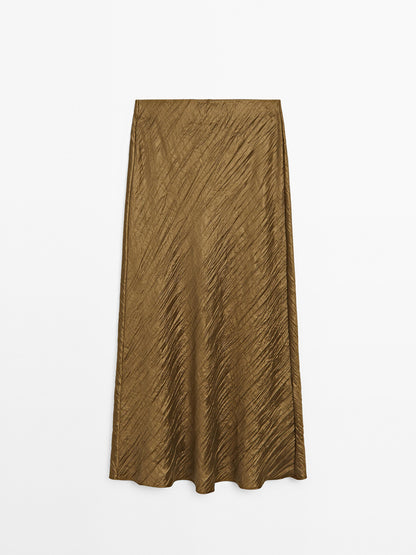 Creased-effect pleated skirt