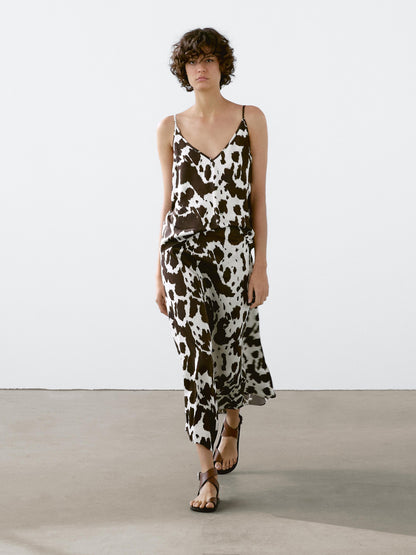 Flowing strappy animal print top