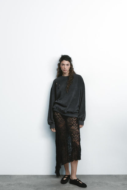 Asymmetric lace skirt