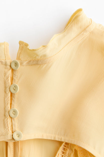 Ruffled open-back dress