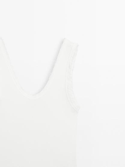 Cotton blend top with frayed piping