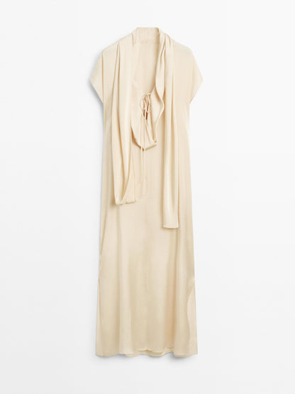Long flowing dress with scarf detail