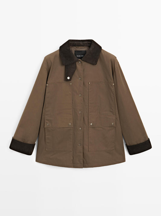 Waxed parka with corduroy detail