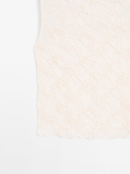 Creased-effect funnel neck top