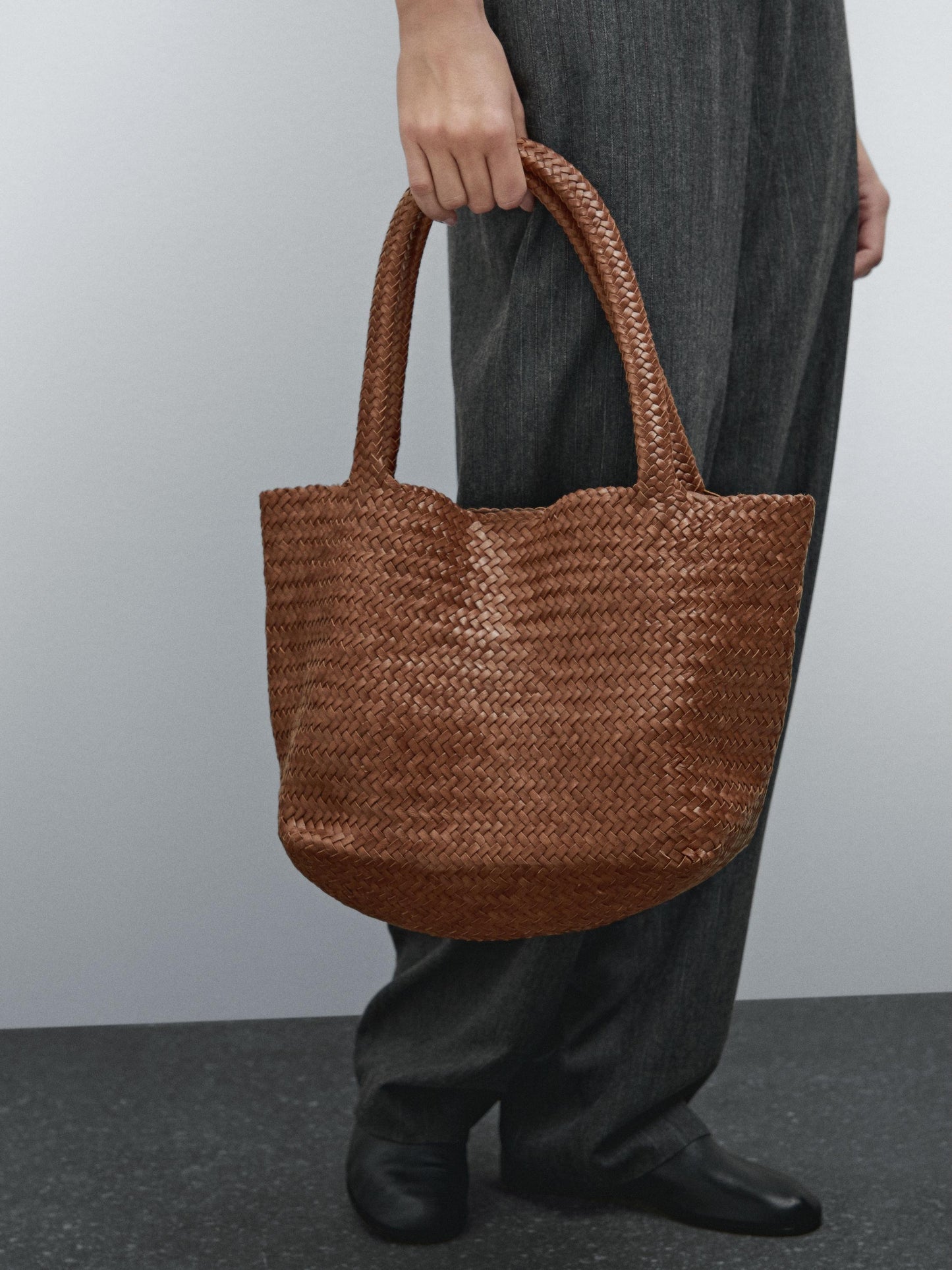 Braided leather half tote bag