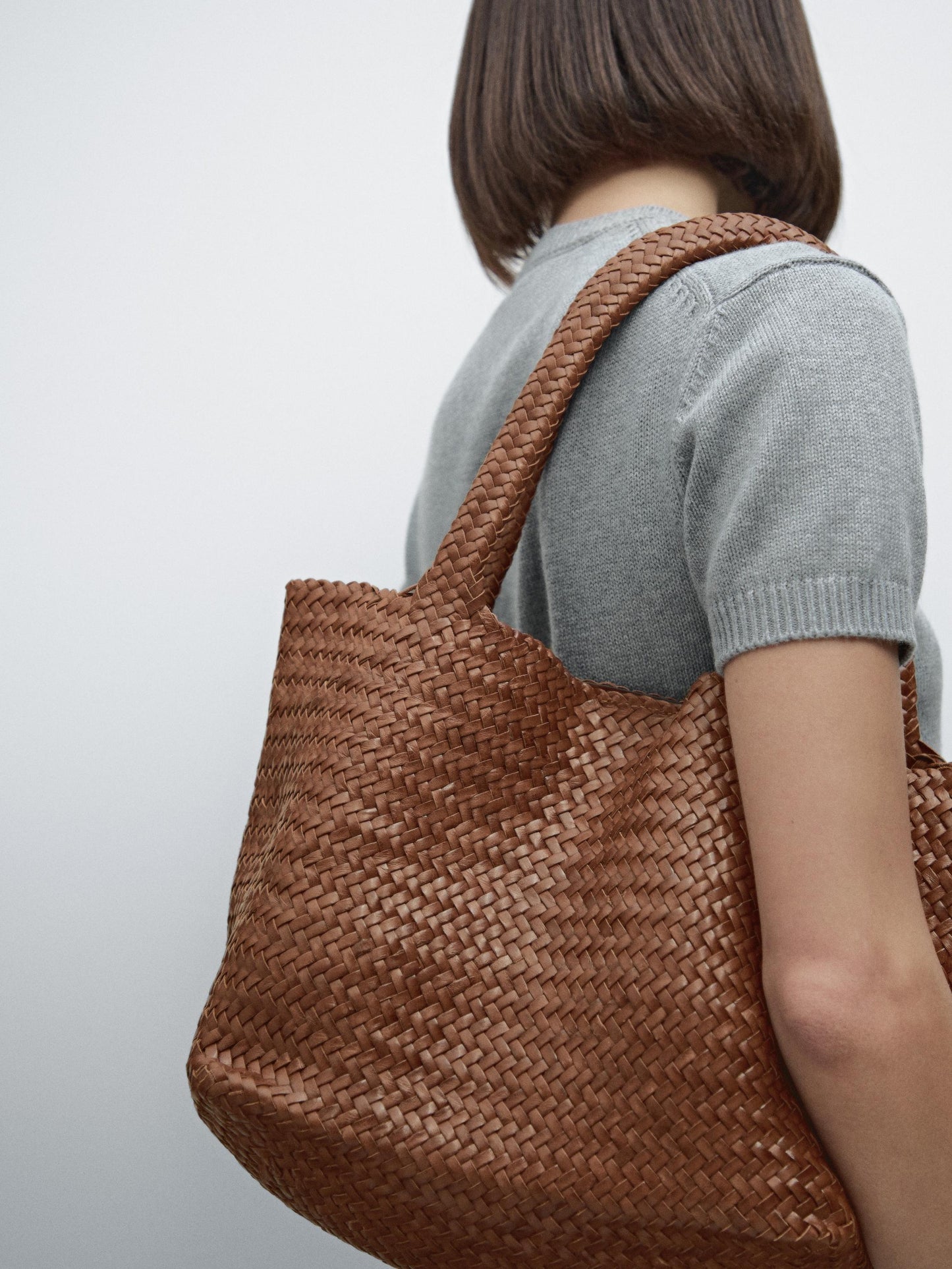 Braided leather half tote bag