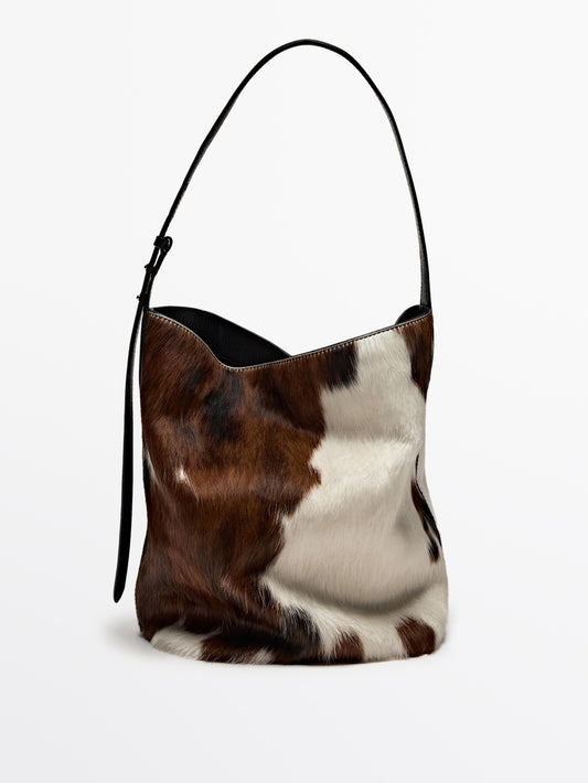 Animal print hair-on leather bucket bag