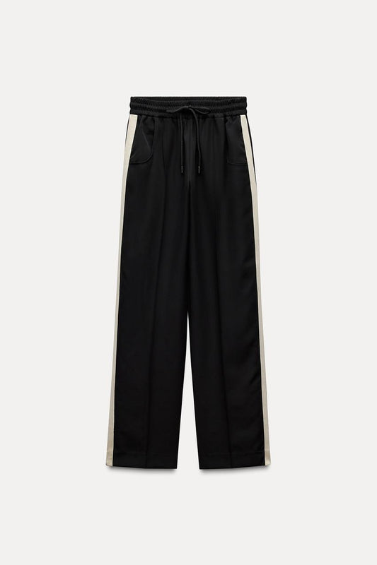 Trousers with side taping