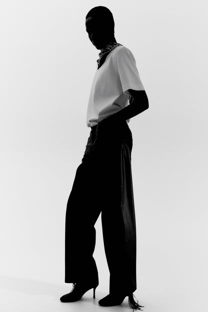 Fringed coated trousers