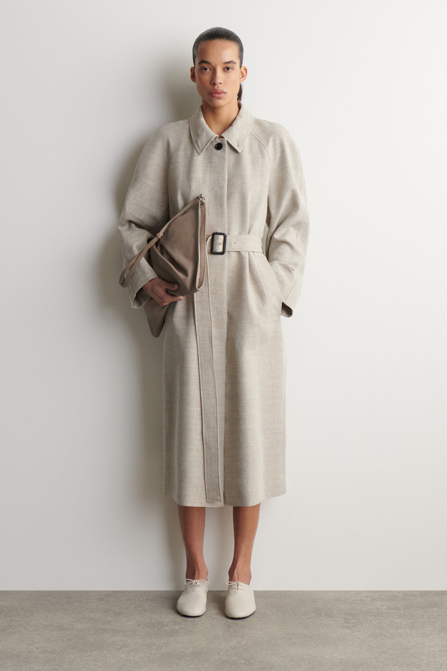 Twisted Leather Clutch Bag