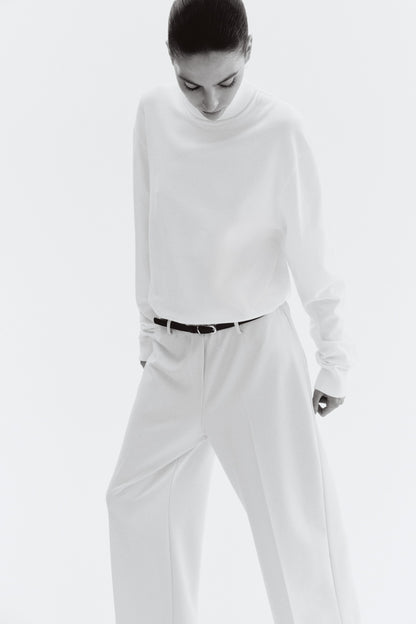 Belted ankle-length trousers