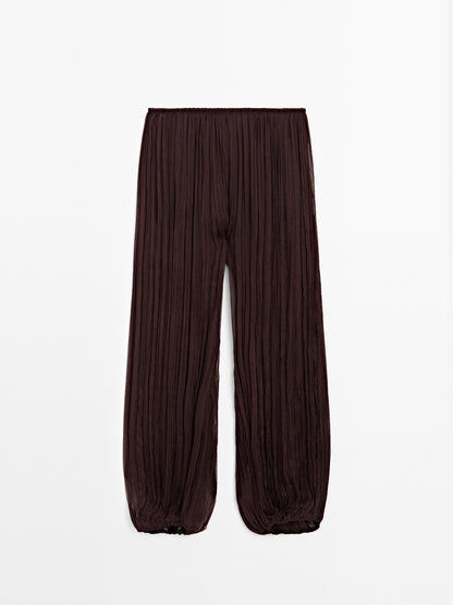 Flowing pleated balloon trousers