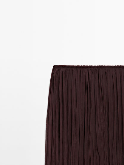 Flowing pleated balloon trousers