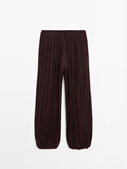 Flowing pleated balloon trousers